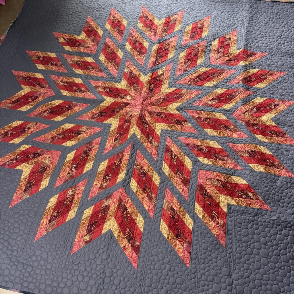 Cosmic feathers, free motion and ruler work, double bed size