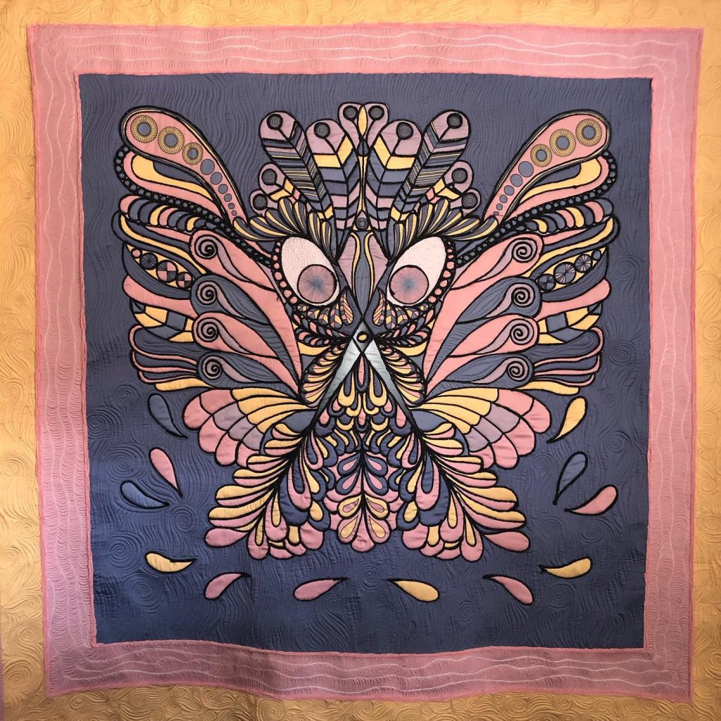 Let sleeping scirros lie is an original design panel, printed on synthetic silk, free motion quilting and couching.