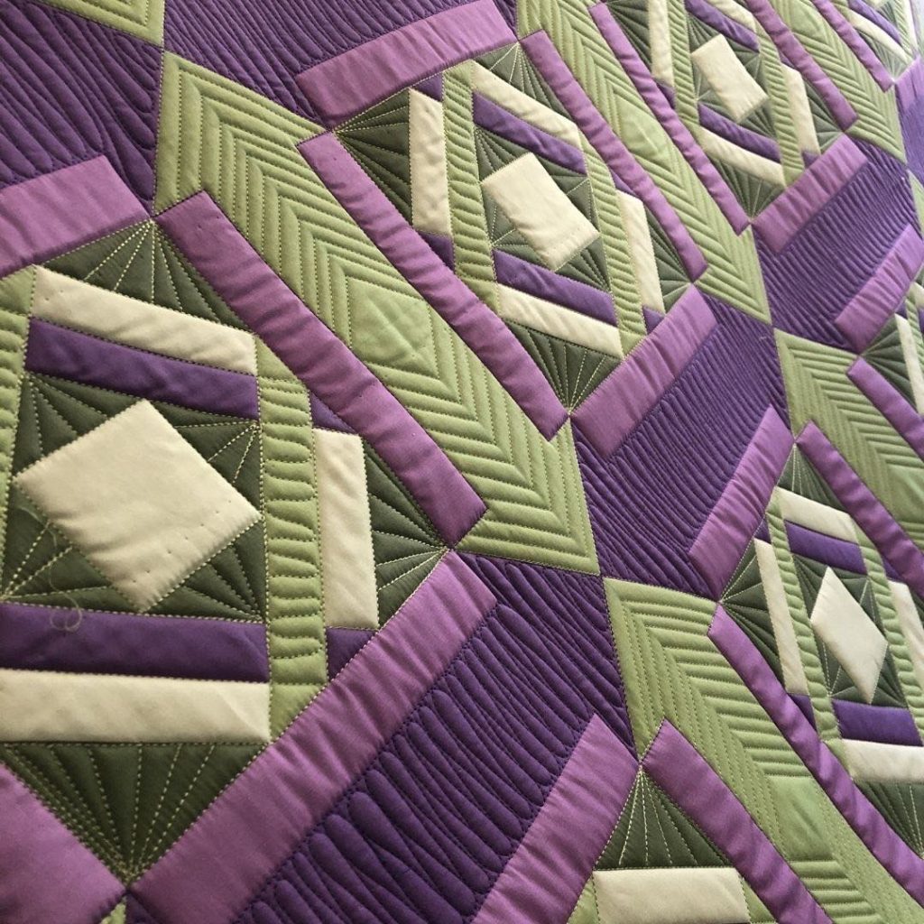 Stevie panel designed by Aggie, quilted with rulers and free motion quilting